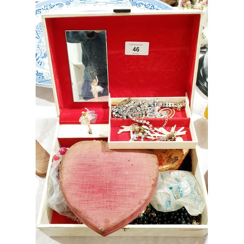 46 - A jewellery box and contents. UK shipping £14.