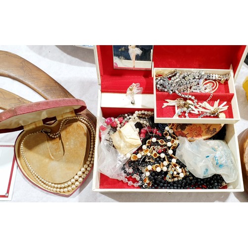 46 - A jewellery box and contents. UK shipping £14.