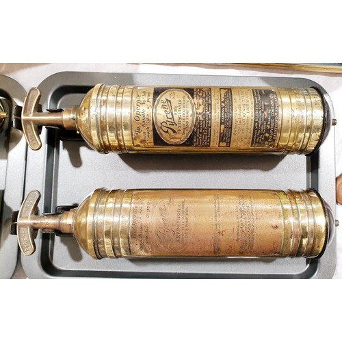 49 - Two vintage brass fire extinguishers. No shipping. Arrange collection or your own packer and shipper... 