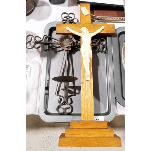 100 - A wrought iron cross candle holder, length 13