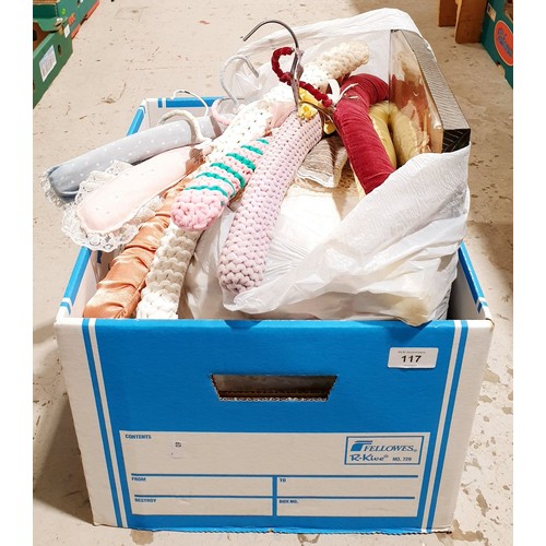 117 - A box of linens and coat hangers. No shipping. Arrange collection or your own packer and shipper, pl... 