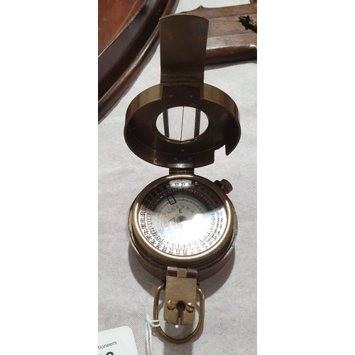 168 - A reproduction brass military style compass. No shipping. Arrange collection or your own packer and ... 