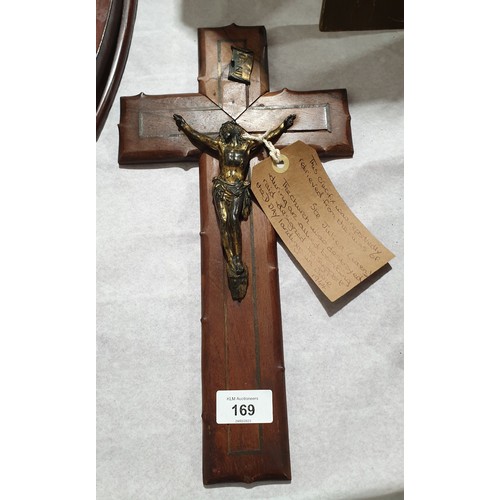 169 - An antique rosewood crucifix with cast metal figure, A/F, length 14.25