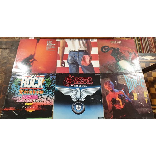 175 - Ten vinyl LPs including Saxon, Fleetwood Mac and Simple Minds together with a 12