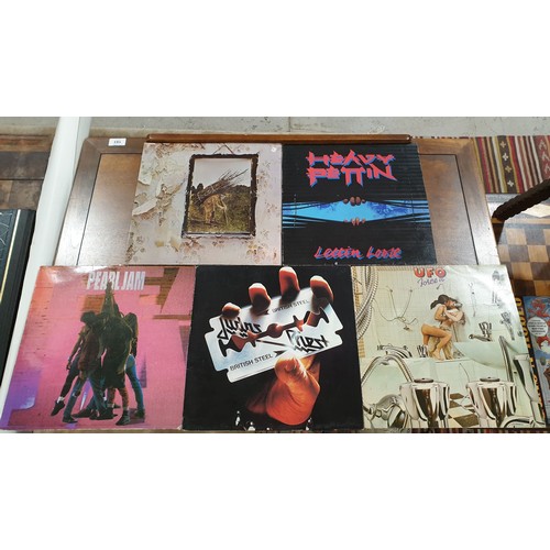 178 - Twelve vinyl LPs including Judus Priest, Led Zepplin and Saxon together with a 7