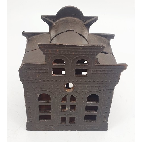 354 - A cast iron City Bank moneybox, height 4