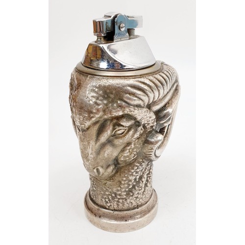 366 - A scarce French cast metal Belide Caps petrol table lighter in the form of a ram's head with bottle ... 