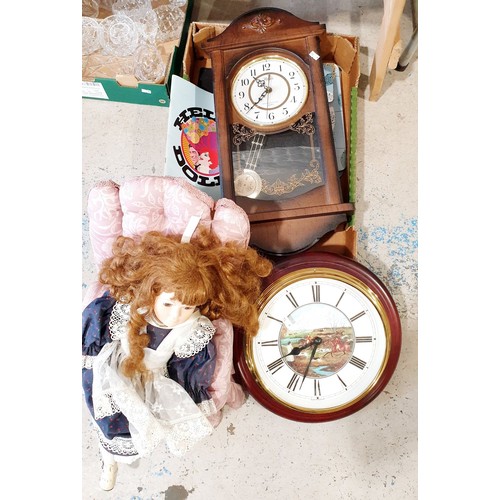 407 - A box including a doll and a wall clock. No shipping. Arrange collection or your own packer and ship... 