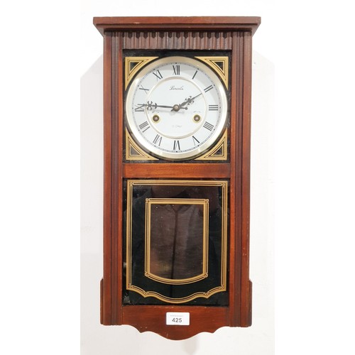 425 - A wall clock, the dial signed Lincoln, length 21