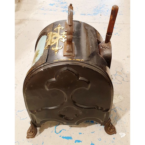 433 - A Victorian Toleware coal scuttle, the front having an oil on glass painting of a bucolic scene toge... 