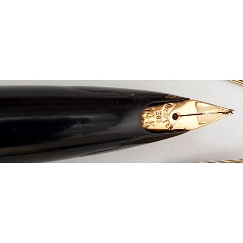 464 - A Shaffer fountain pen with a 14ct gold nib, A/F, a Shaffer ballpoint pen, two other pens and a pair... 