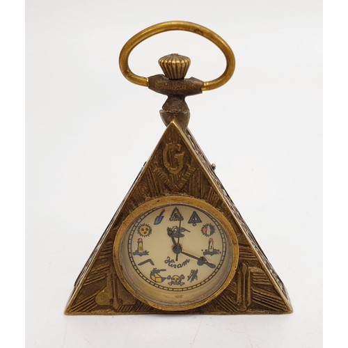 470 - A mechanical triangular shaped Masonic pocket watch, A/F, length 2.5