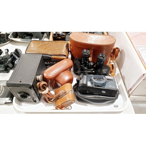 488 - A selection of cameras including a Hanimex 35 dual lens and a vintage pair of Deraisne field glasses... 