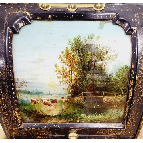 433 - A Victorian Toleware coal scuttle, the front having an oil on glass painting of a bucolic scene toge... 