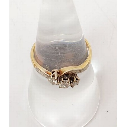 26 - An 18ct gold ring set with three diamonds, gross weight 2.4g, size N. UK shipping £14.