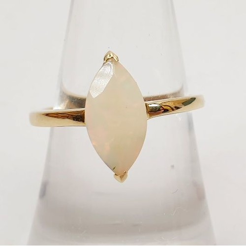 42 - A hallmarked 9ct gold ring set with an opal, gross weight 1.8g, size N/O. UK shipping £14.