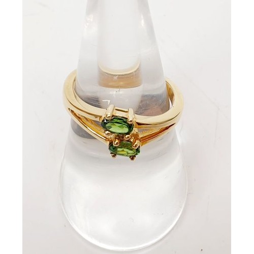 43 - A hallmarked 9ct gold ring set with tsavorite, gross weight 3.1g, size N/O. UK shipping £14.