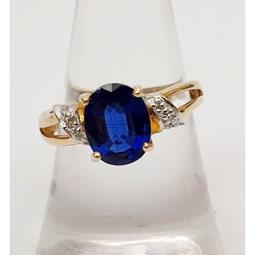 46 - A hallmarked 9ct gold ring set with kyanite and diamonds, gross weight 3g, size N/O. UK shipping £14... 