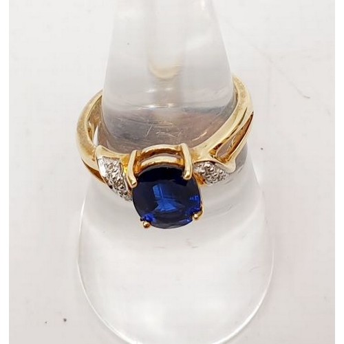 46 - A hallmarked 9ct gold ring set with kyanite and diamonds, gross weight 3g, size N/O. UK shipping £14... 