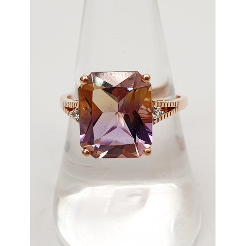 53 - A hallmarked 9ct rose gold ring set with ametrine and white stones, gross weight 3.2g, size Q. UK sh... 