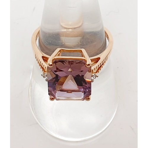 53 - A hallmarked 9ct rose gold ring set with ametrine and white stones, gross weight 3.2g, size Q. UK sh... 