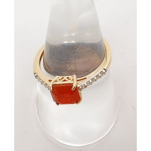 56 - A hallmarked 9ct gold ring set with a fire opal and white stones, gross weight 1.8g, size Q. UK ship... 