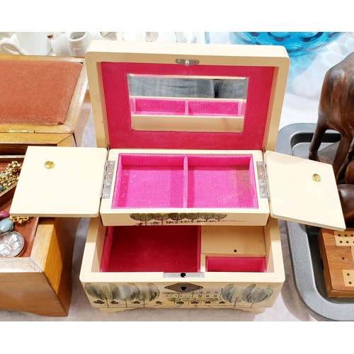 83 - A musical jewellery box together with one other jewellery box and contents. UK shipping £14.