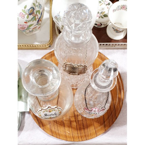 125 - Three cut crystal decanters, the tallest 13