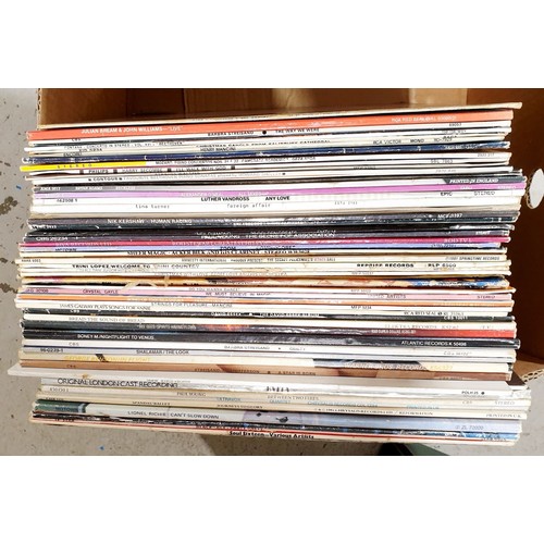 177 - A selection of vinyl LPs and 12