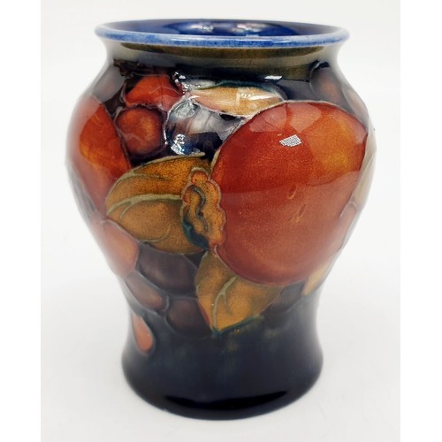 486 - A Moorcroft vase. A/F, height 3.25