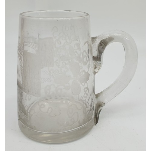 487 - A Georgian glass tankard engraved with an image of Sunderland Bridge and a sailing ship, height 4.25... 