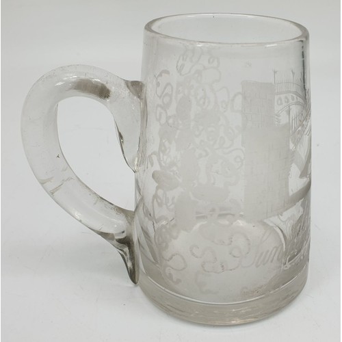 487 - A Georgian glass tankard engraved with an image of Sunderland Bridge and a sailing ship, height 4.25... 