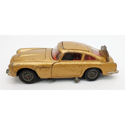 489 - A vintage Corgi James Bond Aston Martin DB5. UK shipping £14.