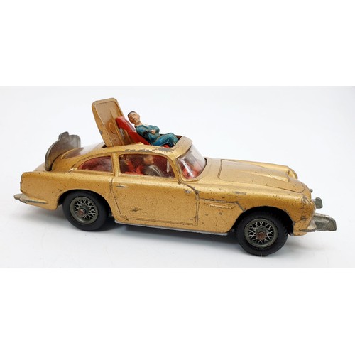 489 - A vintage Corgi James Bond Aston Martin DB5. UK shipping £14.