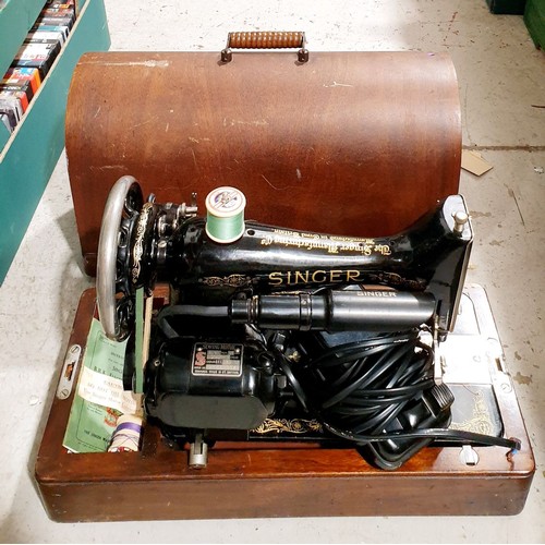 283 - A Singer sewing machine. No shipping. Arrange collection or your own packer and shipper, please. Ele... 