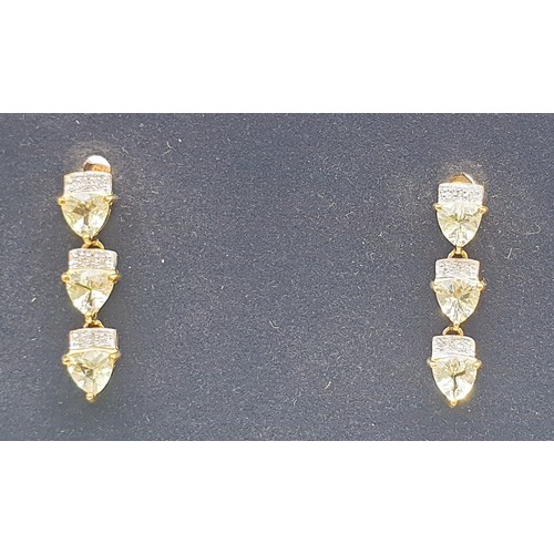 48 - A pair of hallmarked 9ct gold drop earrings set with maricota amblygonite and diamonds, gross weight... 