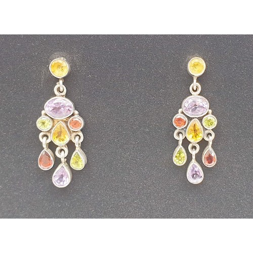 12 - A pair of silver earrings set with coloured gem stones. UK shipping £14.