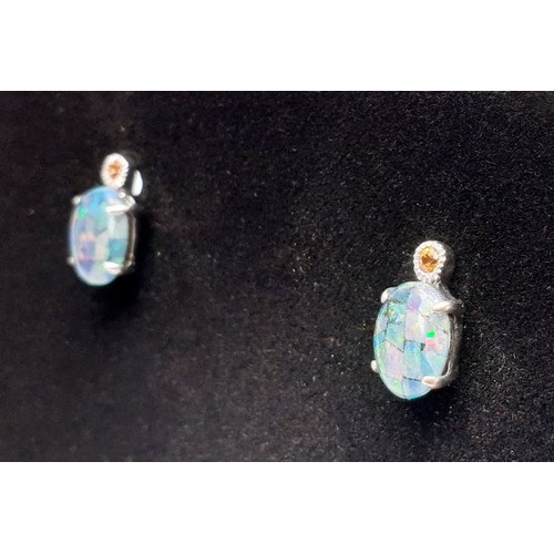 13 - A pair of silver earrings set with mosaic opals and orange sapphires. UK shipping £14.