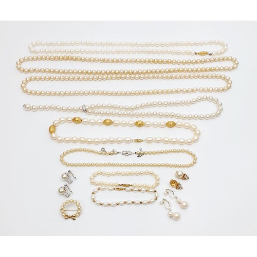 15 - A selection of pearl necklaces, bracelets and earrings, one necklace having an 18ct gold clasp, one ... 