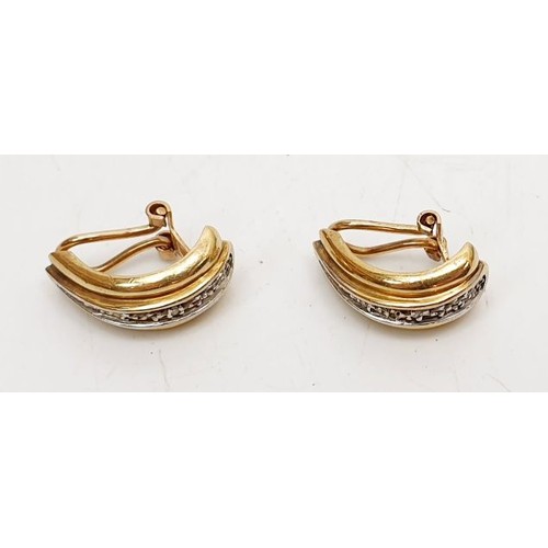 29 - A pair of 9ct gold clip on earrings, weight 5.1g. UK shipping £14.