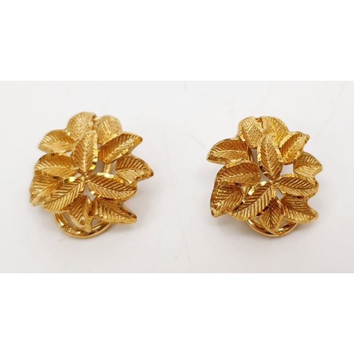 30 - A pair of 9ct gold clip on earrings, weight 4.7g. UK shipping £14.