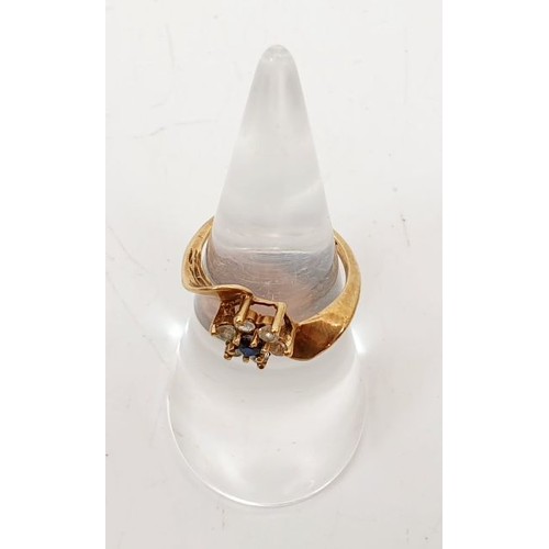 46 - A gold ring (carat mark rubbed) set with a sapphire and white stones, size J/K, gross weight 2g. UK ... 