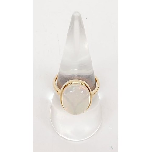 53 - A 9ct gold ring set with AA welo opal, size P/Q, gross weight 3g. UK shipping £14.