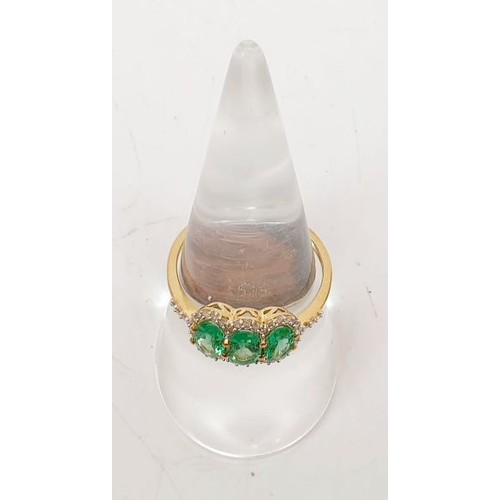 56 - A hallmarked 9ct gold ring set with emeralds and diamonds, size Q, gross weight 1.9g. UK shipping £1... 