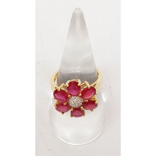 57 - A hallmarked 9ct gold ring set with kokanada ruby and diamonds, size O, gross weight 4.3g. UK shippi... 