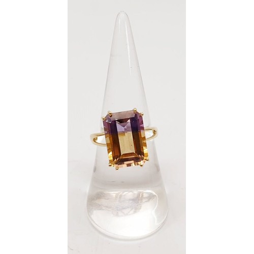 59 - A 10ct gold ring set with ametrine, size O, gross weight 3.7g. UK shipping £14.