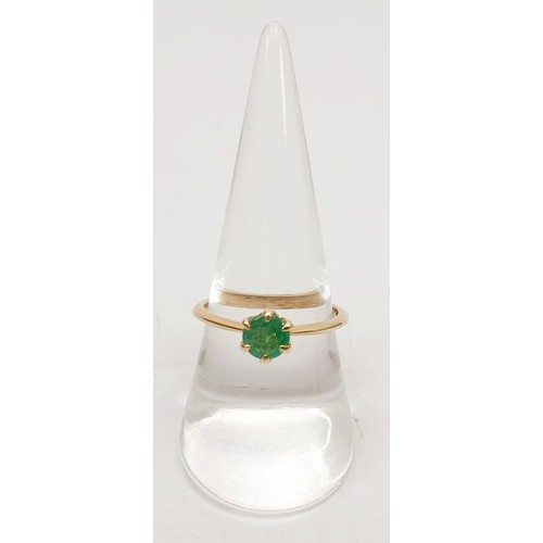 62 - A hallmarked 9ct gold emerald solitaire ring, size P/Q, gross weight 1.8g. UK shipping £14.