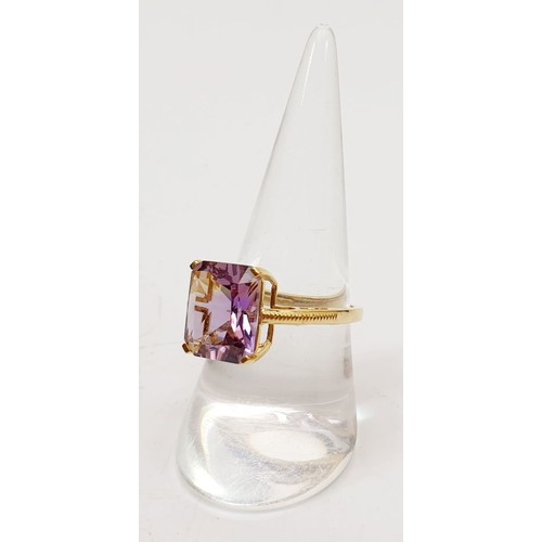 64 - A hallmarked 9ct gold ring set with ametrine, size Q, gross weight 3.2g. UK shipping £14.