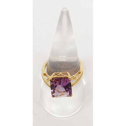 64 - A hallmarked 9ct gold ring set with ametrine, size Q, gross weight 3.2g. UK shipping £14.