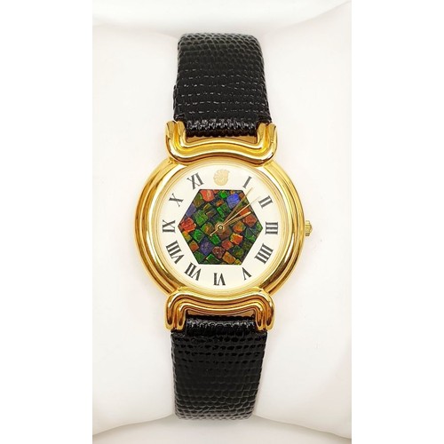 73 - A boxed unisex Ammolite wrist watch, working order. UK shipping £14.